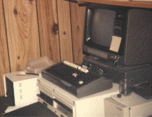 Radio Shack TRS-80 Model I microcomputer running Access-80 bulletin board system (BBS) placed online in November 1977.